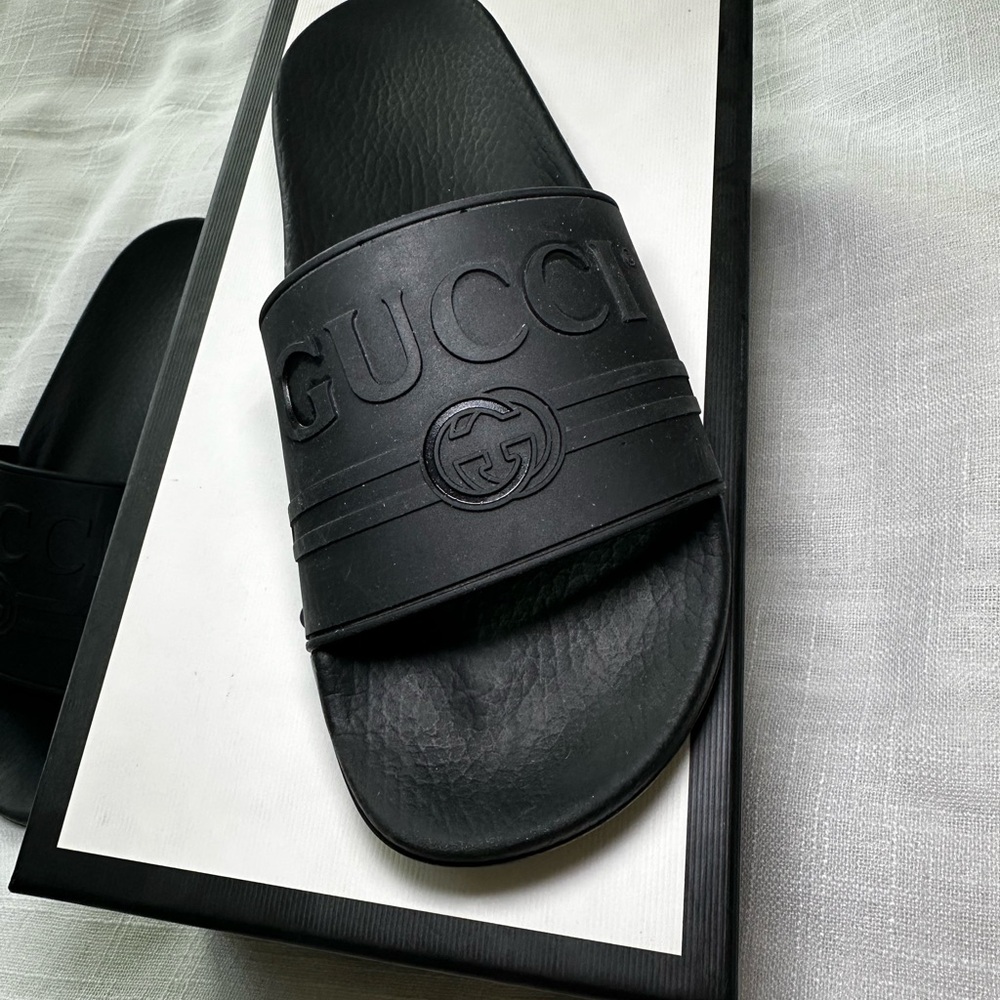Gucci Black Embossed Logo Rubber Slide Sandals for women